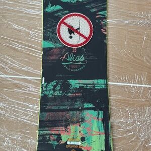 Rossignol Alias Snowboard with Black and Green Design